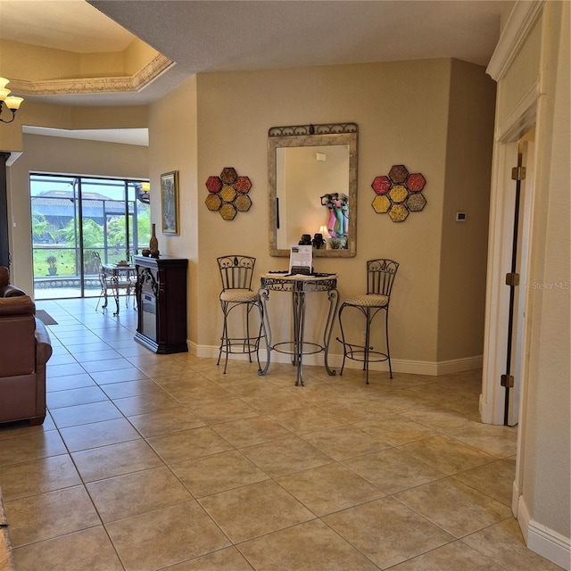 19 Medalist Way, Rotonda West, FL 33947 - hallway with light tile patterned floors and baseboards