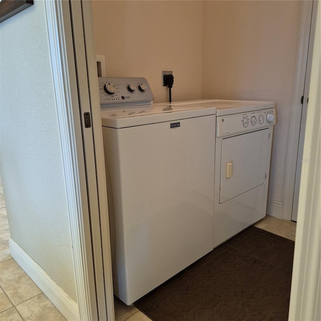 19 Medalist Way, Rotonda West, FL 33947 - laundry room with washing machine and clothes dryer