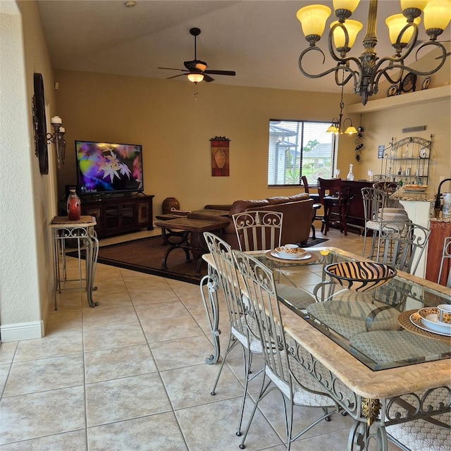19 Medalist Way, Rotonda West, FL 33947 - dining room with a chandelier, ceiling fan, light tile patterned flooring, and lofted ceiling