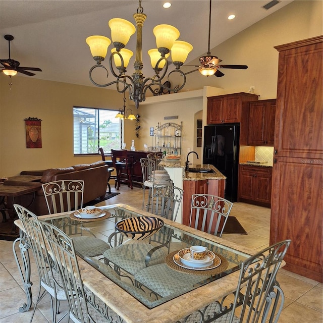 19 Medalist Way, Rotonda West, FL 33947 - dining space with a ceiling fan, light tile patterned flooring, recessed lighting, a chandelier, and lofted ceiling