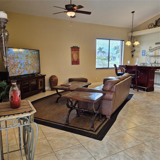 19 Medalist Way, Rotonda West, FL 33947 - living area featuring light tile patterned floors, ceiling fan, and lofted ceiling