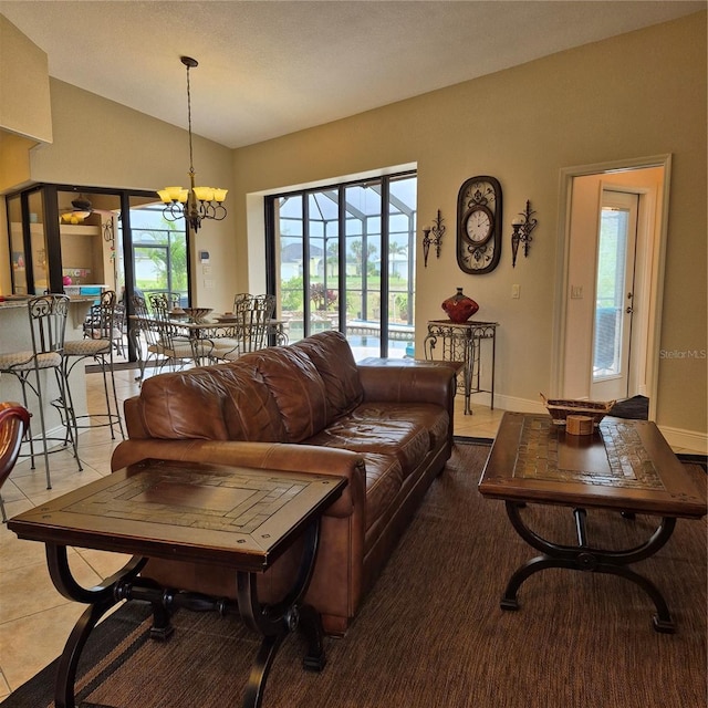 19 Medalist Way, Rotonda West, FL 33947 - tiled living area with lofted ceiling and a chandelier