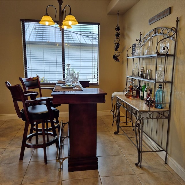 19 Medalist Way, Rotonda West, FL 33947 - dining room featuring tile patterned floors and baseboards