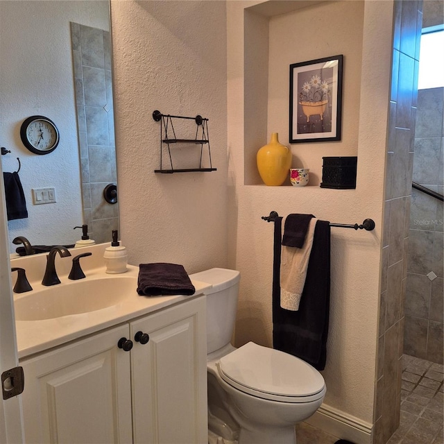 19 Medalist Way, Rotonda West, FL 33947 - bathroom with vanity, a textured wall, and tiled shower