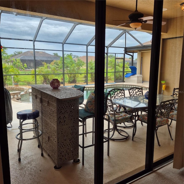 19 Medalist Way, Rotonda West, FL 33947 - view of patio / terrace with an outdoor pool, glass enclosure, a ceiling fan, and a hot tub