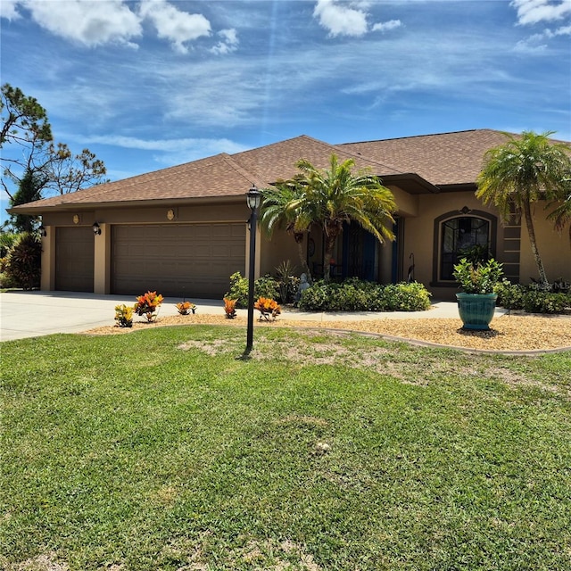 19 Medalist Way, Rotonda West, FL 33947 - single story home featuring a garage, stucco siding, driveway, a front yard, and a shingled roof