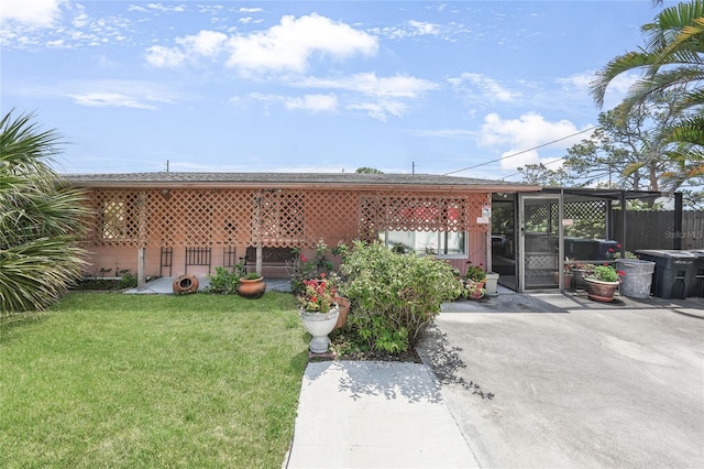 857 Palmetto St, Englewood, FL 34223 - rear view of property with a patio area
