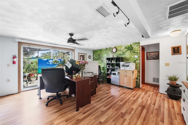 857 Palmetto St, Englewood, FL 34223 - home office featuring light wood-style flooring, a ceiling fan, and rail lighting