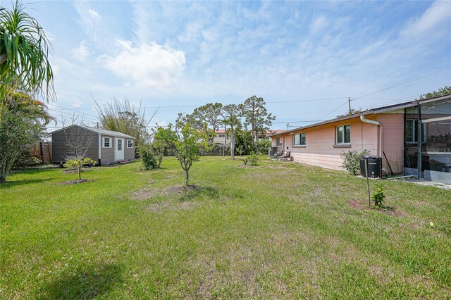 857 Palmetto St, Englewood, FL 34223 - view of grassy yard featuring an outdoor structure
