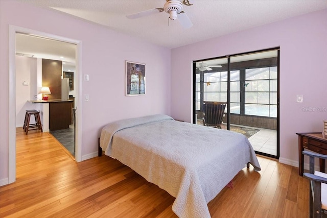 7180 Quarry St, Englewood, FL 34224 - bedroom with access to outside, light wood-style floors, baseboards, and ceiling fan