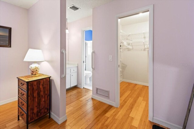 7180 Quarry St, Englewood, FL 34224 - hall featuring light wood finished floors and baseboards