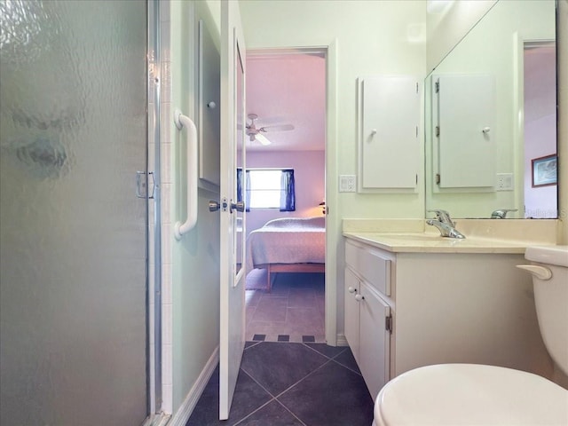 7180 Quarry St, Englewood, FL 34224 - bathroom with toilet, tile patterned flooring, a shower stall, and ensuite bathroom