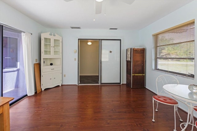 7180 Quarry St, Englewood, FL 34224 - dining area with wood finished floors, a ceiling fan, and baseboards