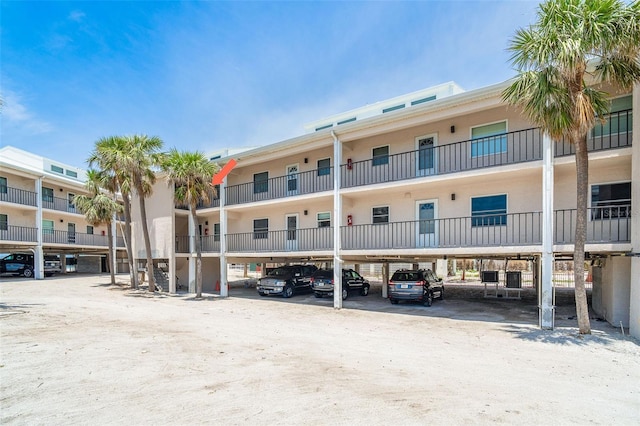 2700 N Beach Rd Unit A201, Englewood, FL 34223 - view of property with covered parking