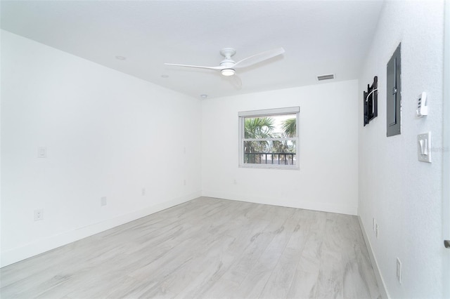 2700 N Beach Rd Unit A201, Englewood, FL 34223 - empty room with a ceiling fan, light wood finished floors, and baseboards