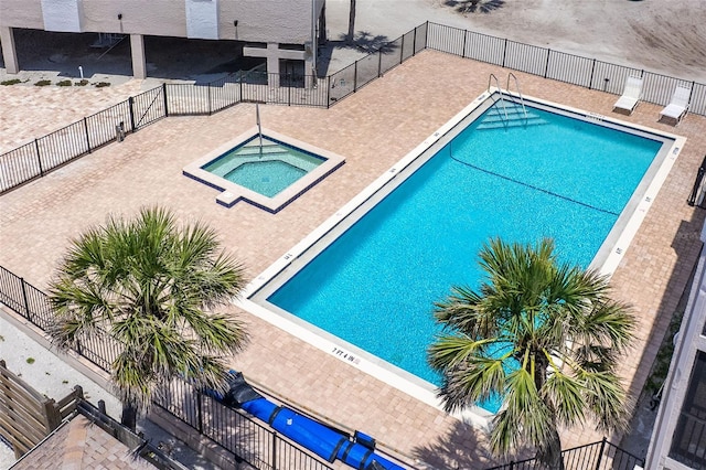 2700 N Beach Rd Unit A201, Englewood, FL 34223 - community pool featuring a community hot tub, fence, and a patio area