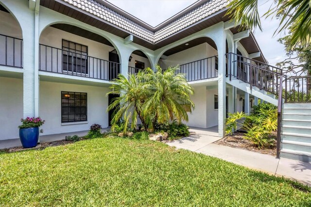 149 Englewood Isles Parkway Unit 603, Englewood, FL 34223 - view of building exterior with stairs