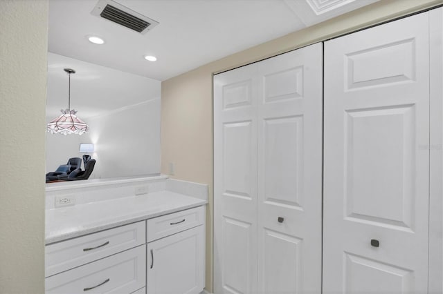 149 Englewood Isles Parkway Unit 603, Englewood, FL 34223 - kitchen with light countertops, white cabinets, pendant lighting, and recessed lighting
