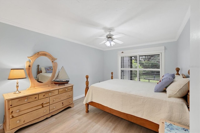 149 Englewood Isles Parkway Unit 603, Englewood, FL 34223 - bedroom featuring light wood-style flooring, ornamental molding, ceiling fan, and baseboards