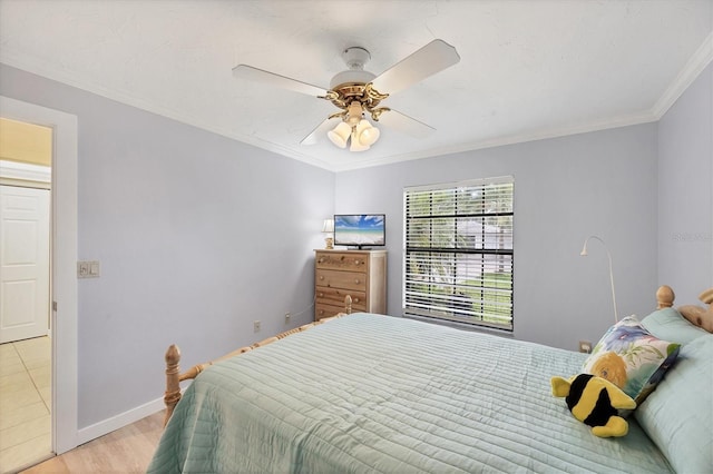 149 Englewood Isles Parkway Unit 603, Englewood, FL 34223 - bedroom with light wood-style floors, crown molding, baseboards, and ceiling fan