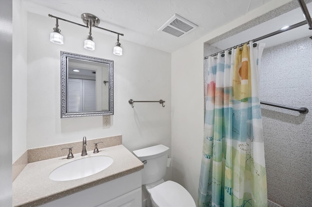 149 Englewood Isles Parkway Unit 603, Englewood, FL 34223 - bathroom featuring vanity, toilet, and a shower with shower curtain