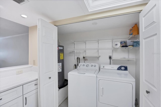 149 Englewood Isles Parkway Unit 603, Englewood, FL 34223 - laundry room featuring washer and dryer, electric water heater, and recessed lighting