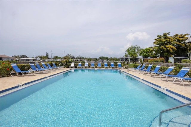 149 Englewood Isles Parkway Unit 603, Englewood, FL 34223 - community pool with a patio