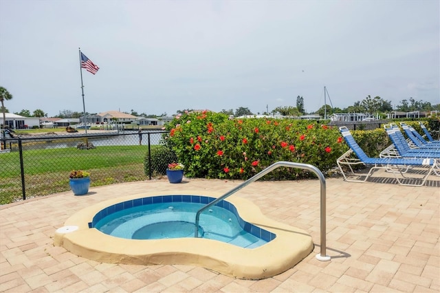 149 Englewood Isles Parkway Unit 603, Englewood, FL 34223 - view of swimming pool featuring fence and a hot tub