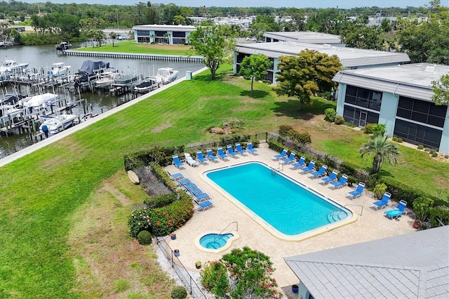149 Englewood Isles Parkway Unit 603, Englewood, FL 34223 - community pool with a water view and a patio area