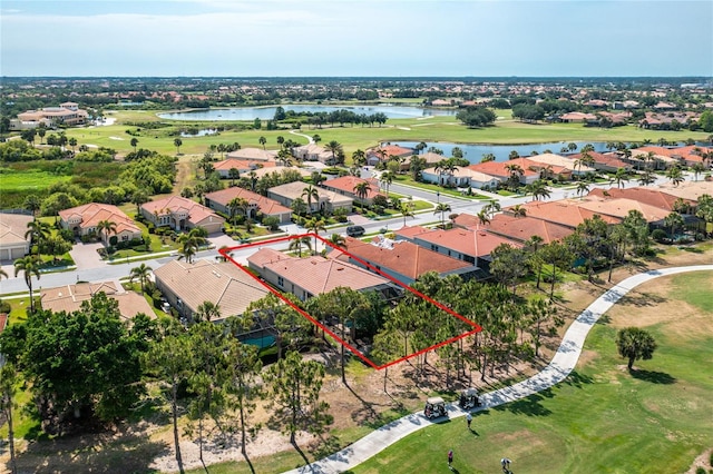 142 Savona Way N, Venice, FL 34275 - aerial view of residential area featuring a golf club, property boundaries highlighted, and a large body of water