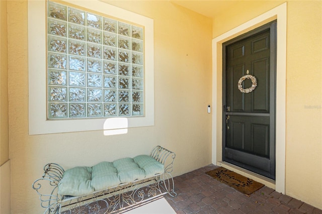 142 Savona Way N, Venice, FL 34275 - view of exterior entry with stucco siding