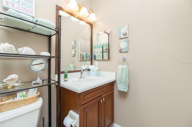 142 Savona Way N, Venice, FL 34275 - half bath featuring vanity and toilet