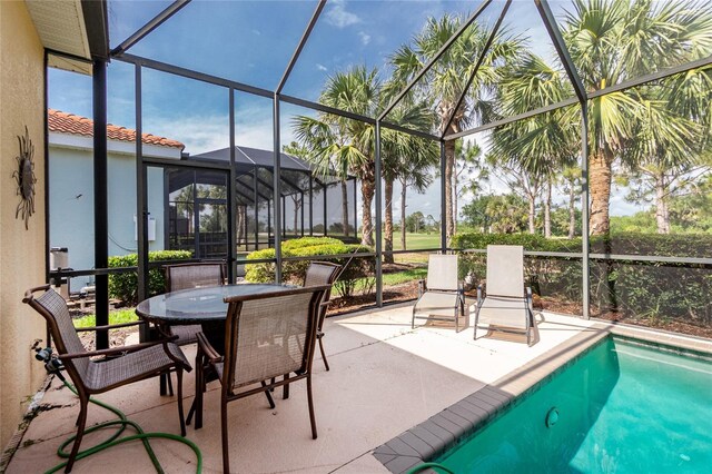 142 Savona Way N, Venice, FL 34275 - view of swimming pool featuring a patio area, a lanai, and outdoor dining area