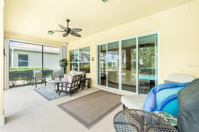 142 Savona Way N, Venice, FL 34275 - sunroom featuring a ceiling fan, outdoor lounge area, and plenty of natural light