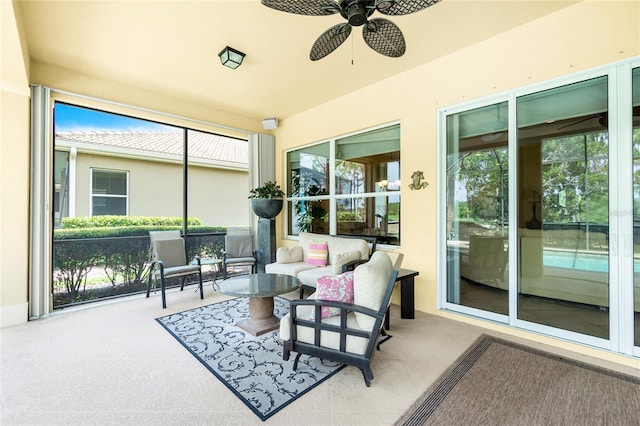 142 Savona Way N, Venice, FL 34275 - sunroom featuring ceiling fan, carpet floors, and outdoor lounge area