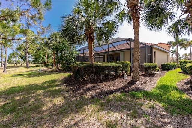 142 Savona Way N, Venice, FL 34275 - view of green lawn featuring a lanai