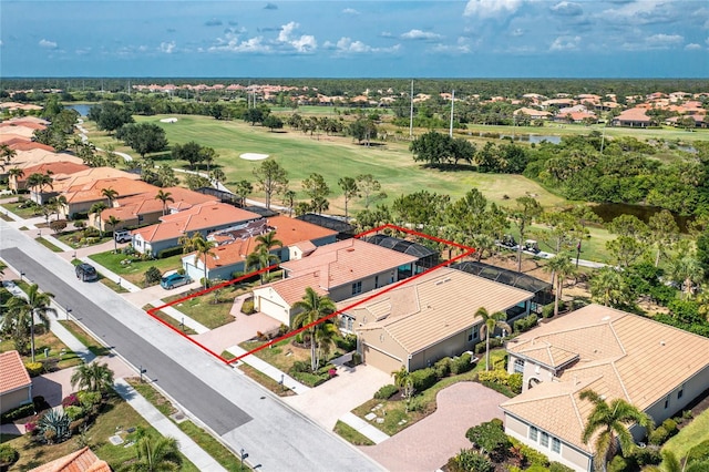 142 Savona Way N, Venice, FL 34275 - aerial view of residential area with a golf club, property boundaries highlighted, and a large body of water
