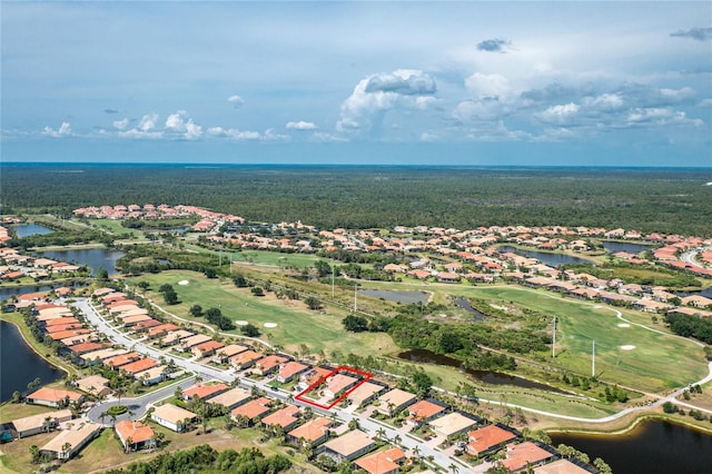 142 Savona Way N, Venice, FL 34275 - aerial overview of property's location with nearby suburban area, a large body of water, and a golf course