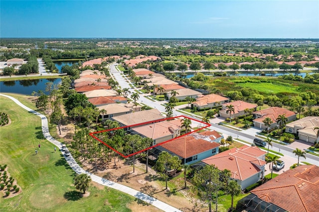 142 Savona Way N, Venice, FL 34275 - aerial view of residential area featuring a large body of water, property parcel outlined, and a local golf course
