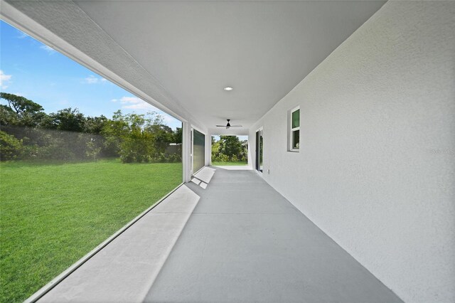 171 Mark Twain Ln, Rotonda West, FL 33947 - view of patio / terrace featuring a ceiling fan