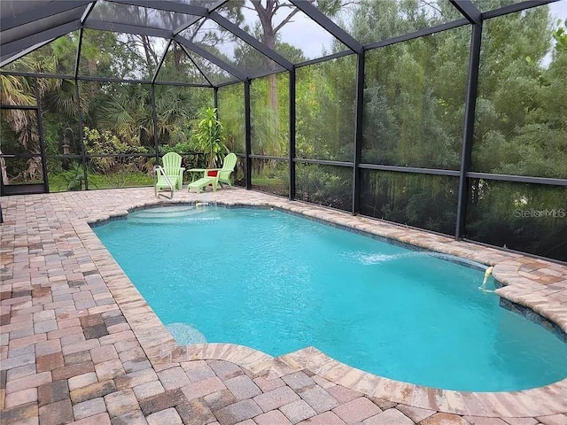 142 Yellow Pine Dr, Rotonda West, FL 33947 - outdoor pool featuring a lanai and a patio area