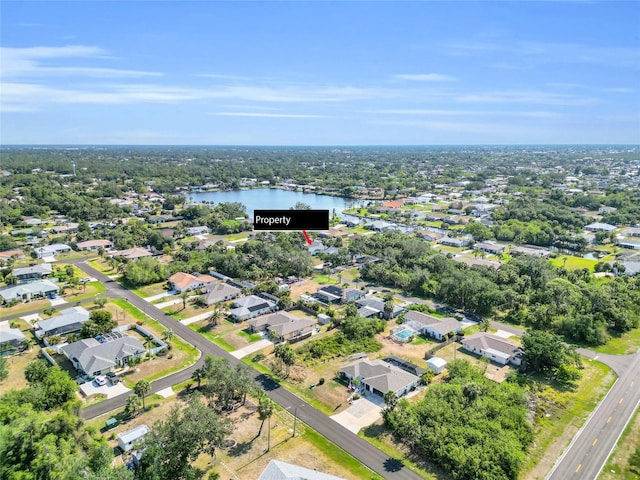 4210 Day St, Port Charlotte, FL 33948 - aerial view of property's location featuring a large body of water and nearby suburban area