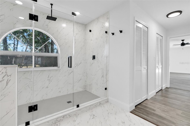 4210 Day St, Port Charlotte, FL 33948 - bathroom featuring a marble finish shower, marble finish flooring, and baseboards