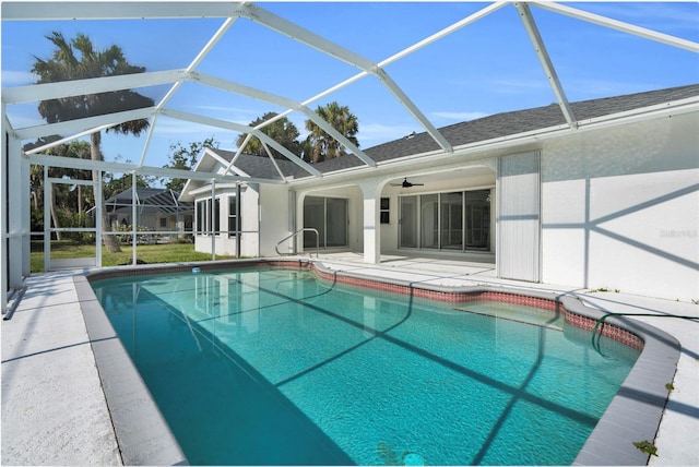 4210 Day St, Port Charlotte, FL 33948 - outdoor pool with a patio area, glass enclosure, and a ceiling fan