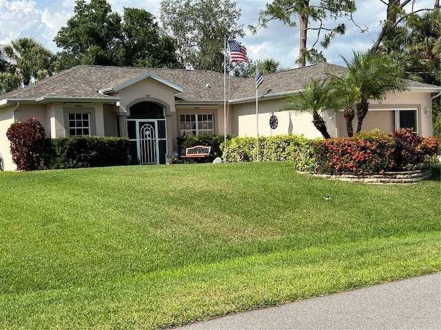 ranch-style house with stucco siding and a front lawn