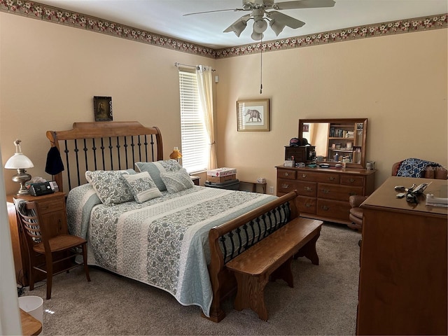 bedroom with carpet and a ceiling fan