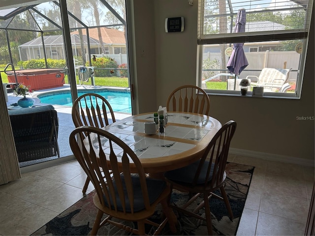 tiled dining area with baseboards