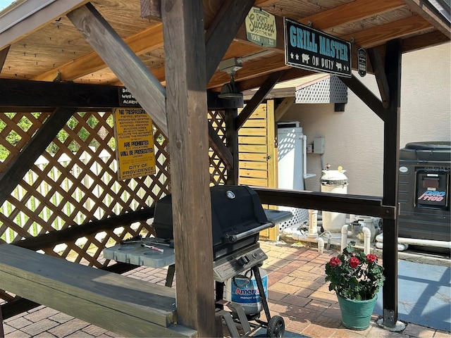 wooden deck with grilling area