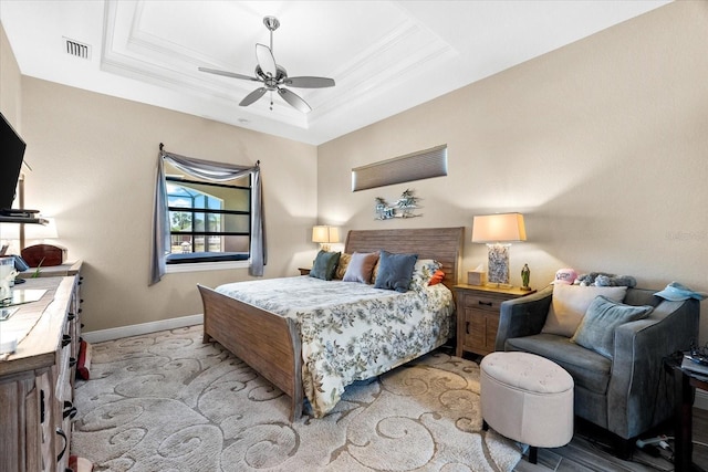 15044 San Domingo Blvd, Port Charlotte, FL 33981 - bedroom featuring a raised ceiling, baseboards, crown molding, and a ceiling fan