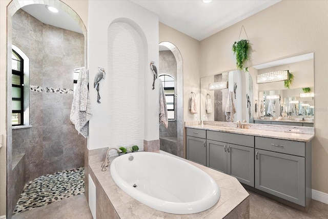 15044 San Domingo Blvd, Port Charlotte, FL 33981 - full bathroom with a bath, vanity, a walk in shower, and tile patterned flooring